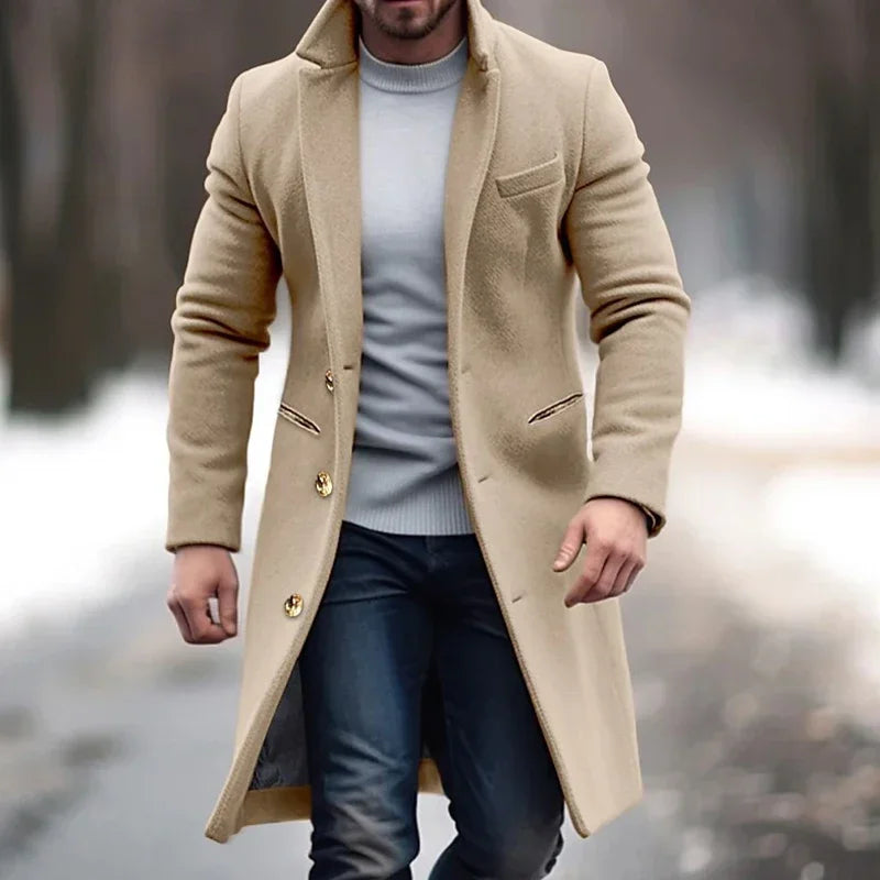 Man wearing beige wool overcoat and jeans outdoors in winter, Auretier fashion