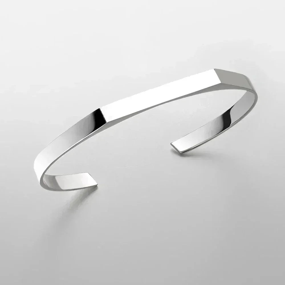 Sleek silver cuff bracelet on white background, Auretier modern jewelry accessory