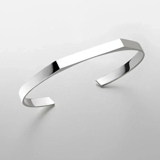 Sleek silver cuff bracelet on white background, Auretier modern jewelry accessory