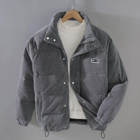 Gray corduroy puffer jacket with patch logo, displayed on hanger, Auretier fashion