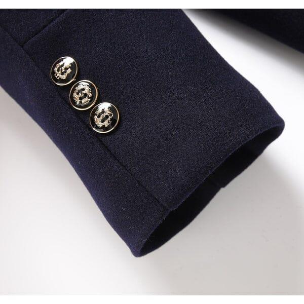 Navy overcoat sleeve with three gold decorative buttons, Auretier fashion detail