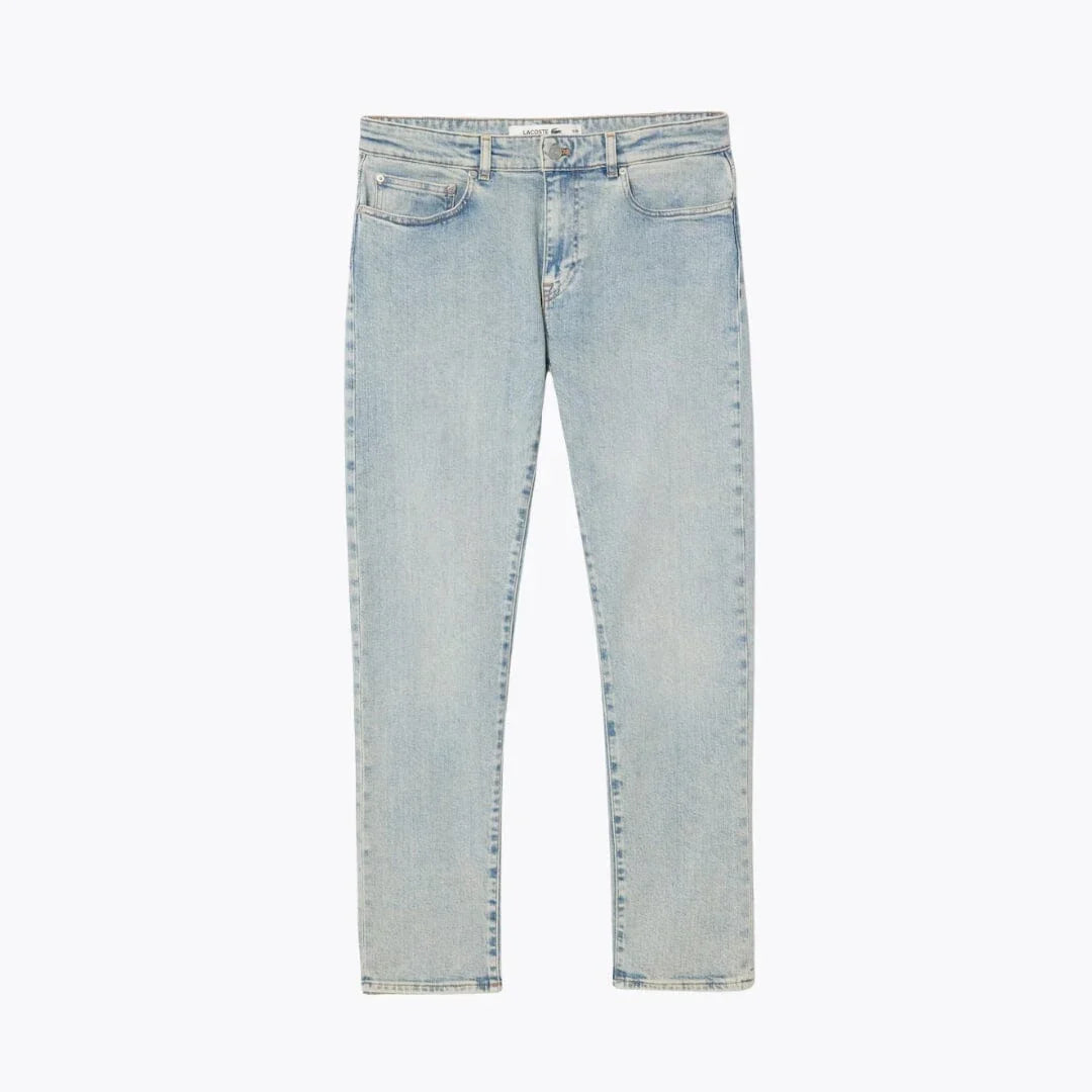 Auretier slim fit light blue denim jeans, five-pocket style, front view on white background.