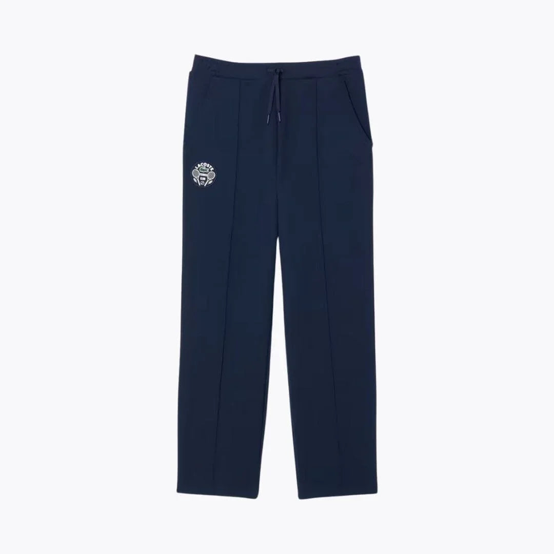 Auretier midnight blue tennis heritage sweatpants with drawstring waist and embroidered logo.