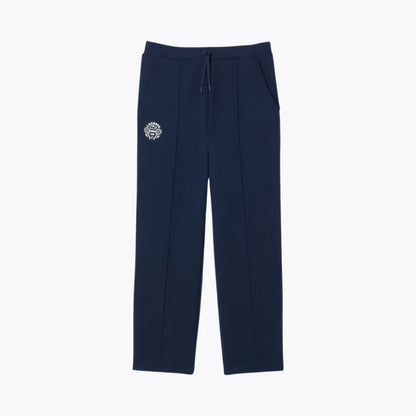 Auretier midnight blue tennis heritage sweatpants with drawstring waist and embroidered logo.