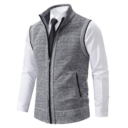 Grey fleece zip-up vest over white dress shirt and black tie, men's fashion by Auretier