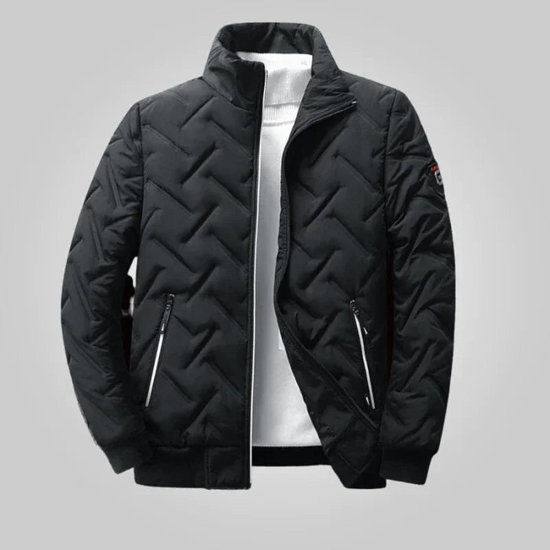 Black urban style transition jacket with zigzag quilted pattern from Auretier on gray background