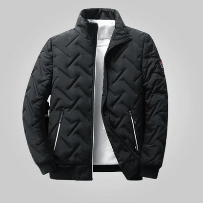 Black urban style transition jacket with zigzag quilted pattern from Auretier on gray background